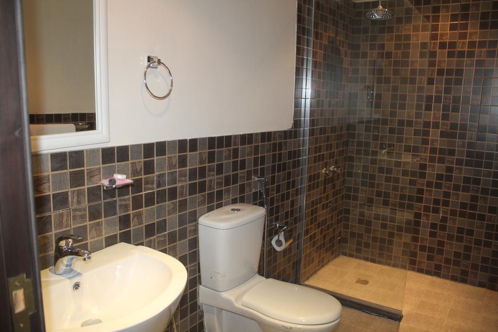 Talia Furnished Apartments Rijád Szoba fotó
