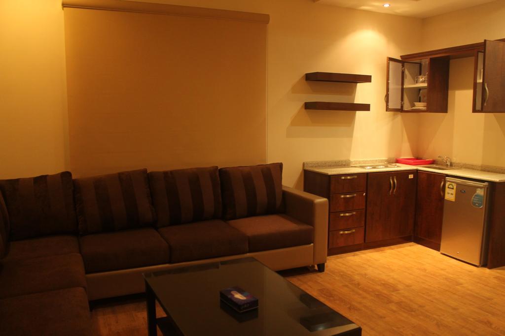 Talia Furnished Apartments Rijád Szoba fotó